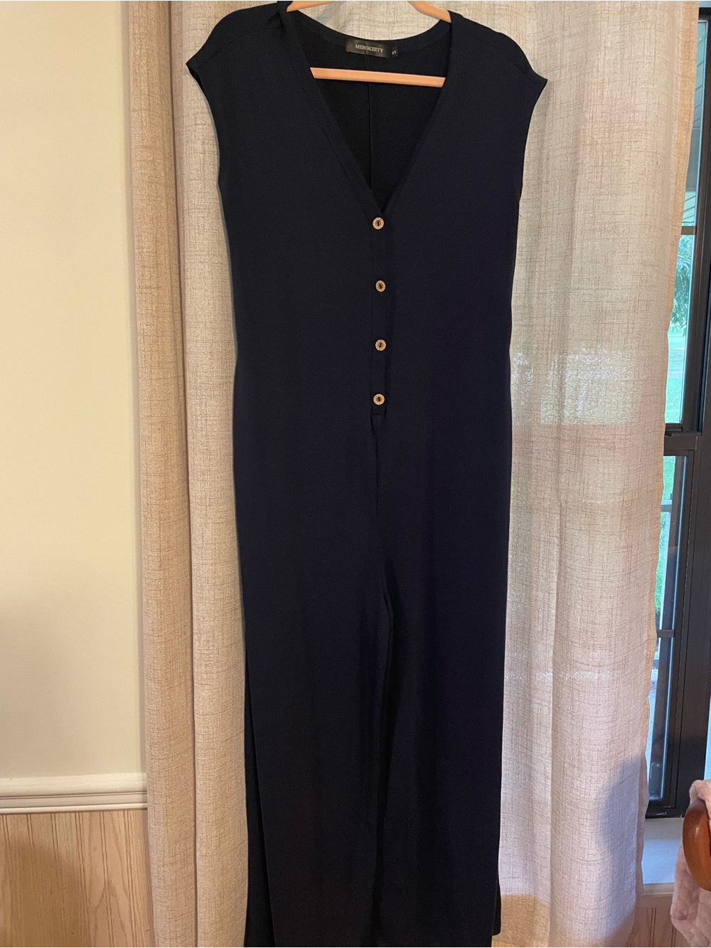 Sleeveless V-Neck Button-Front Jumpsuit in Navy
